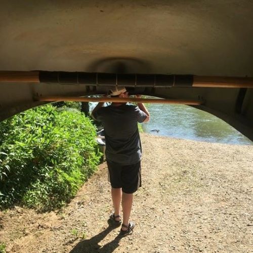 Carrying a canoe overhead